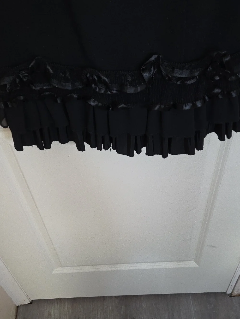 Joseph Ribkoff Classic Black Sleeveless Dress with Ruffle Hem